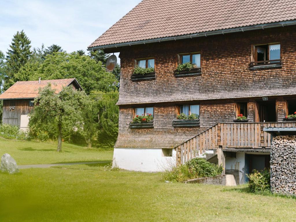 a house with flower boxes on the side of it at Haus Berchtold am Hüttersberg in Doren