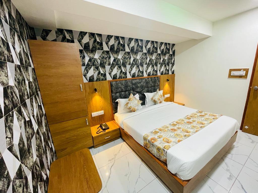 Postel nebo postele na pokoji v ubytování Hotel Lemon Gota