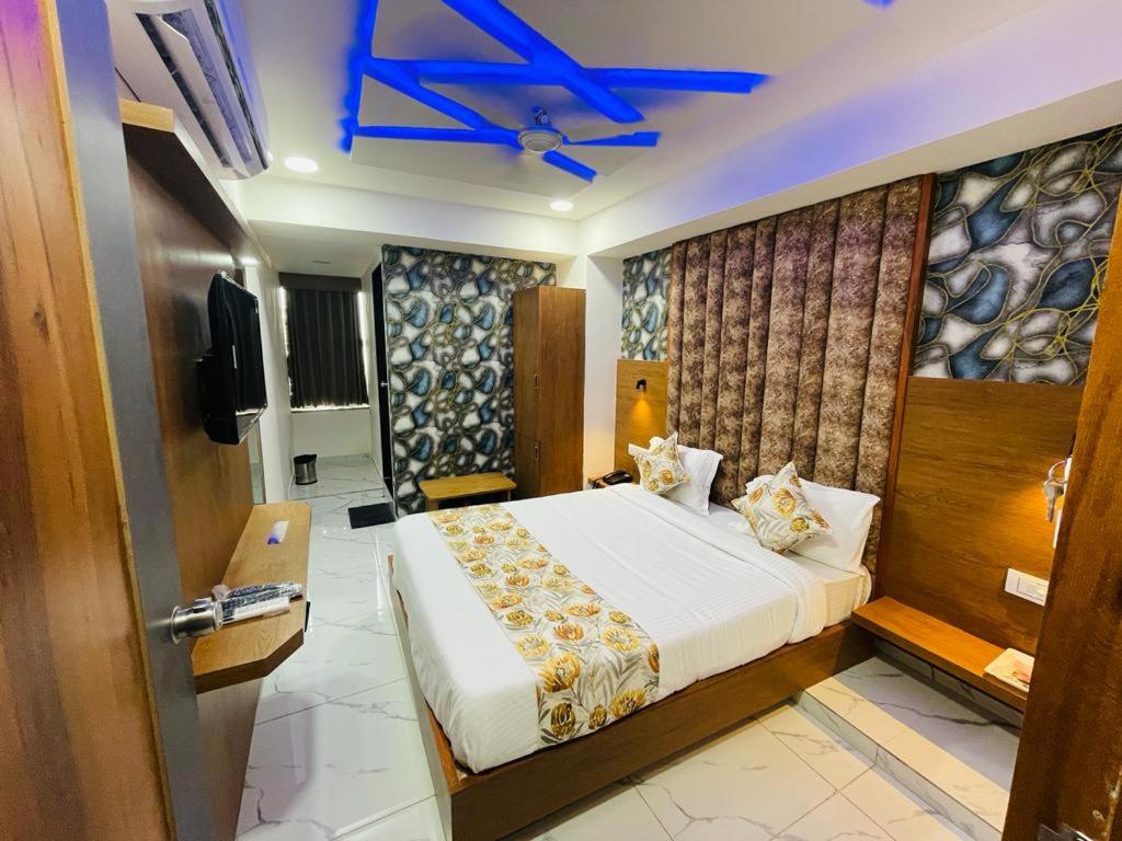 Postel nebo postele na pokoji v ubytování Hotel Lemon Gota