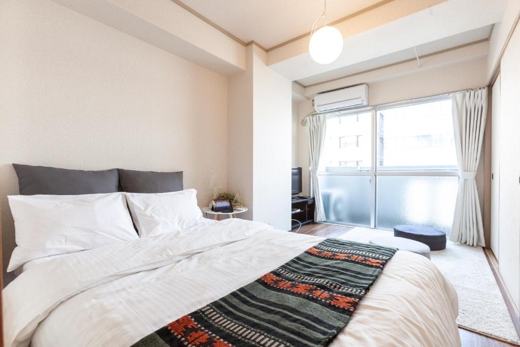 hojo building - One-Bedroom Apartment