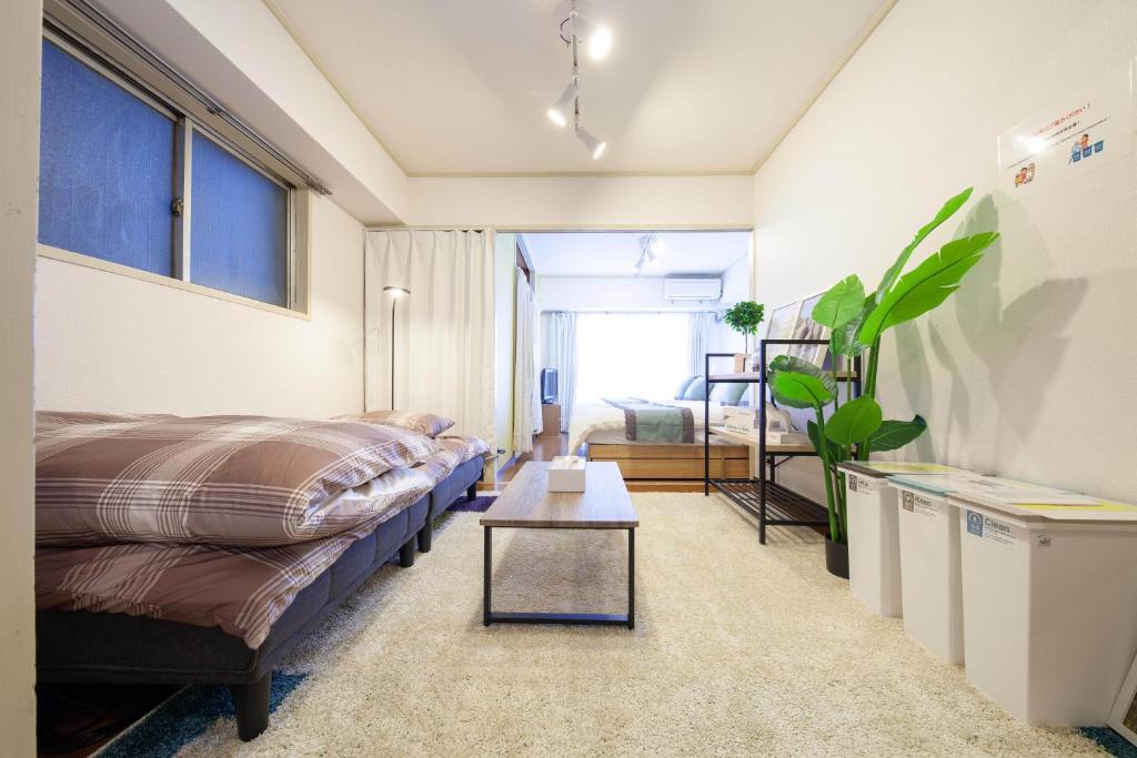 hojo building - One-Bedroom Apartment
