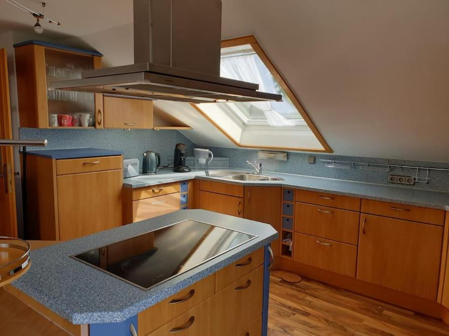 Kuchyň nebo kuchyňský kout v ubytování Moderne DG-Wohnung in Mainleus