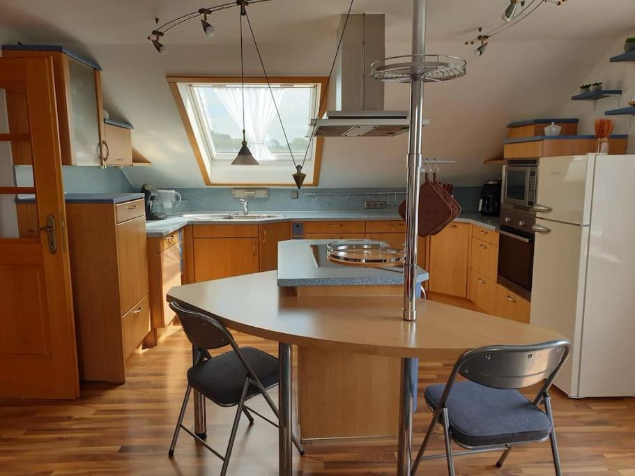 Kuchyň nebo kuchyňský kout v ubytování Moderne DG-Wohnung in Mainleus