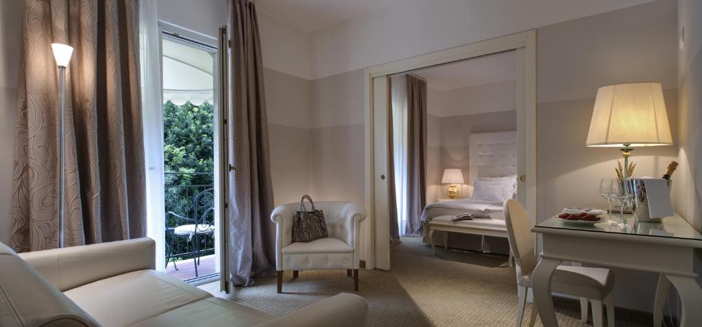 Postel nebo postele na pokoji v ubytování Palace Hotel San Pietro