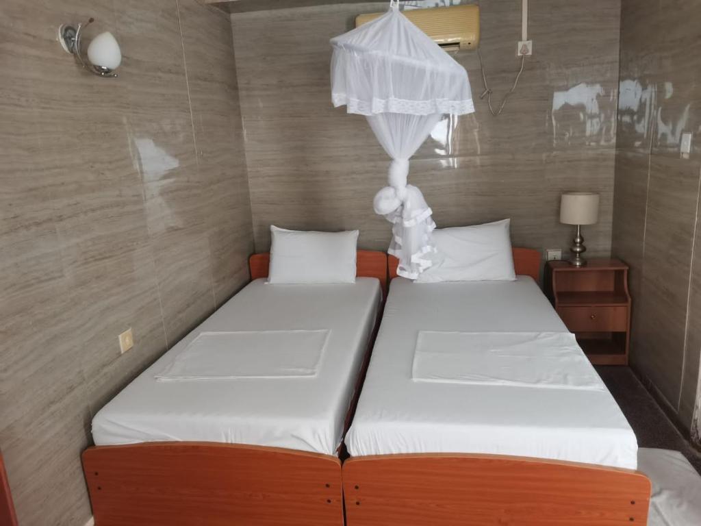 Postel nebo postele na pokoji v ubytování Milano Tourist Rest