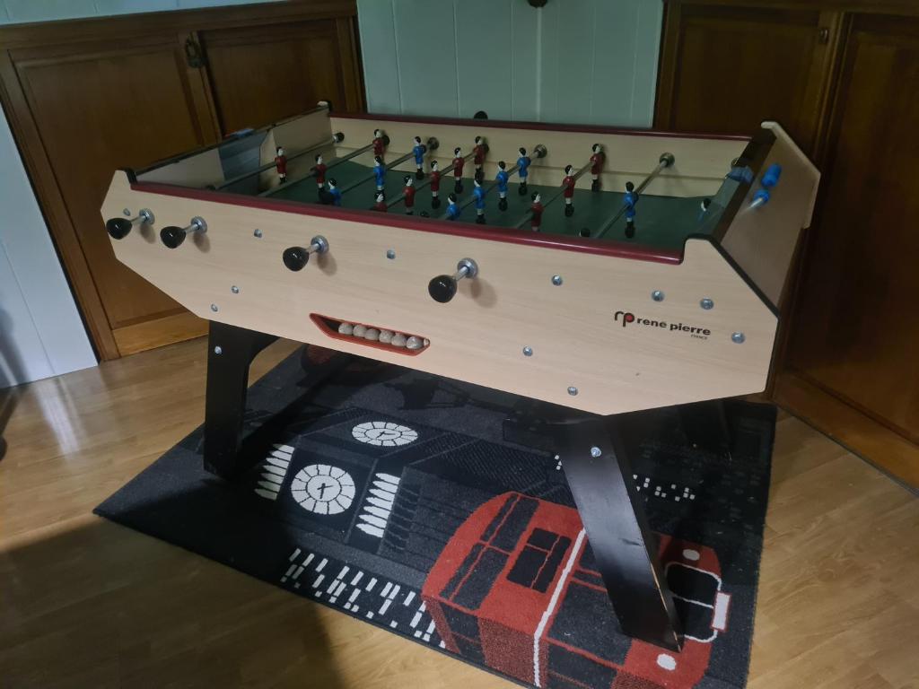 a wooden foosball table with at LE GALOPIN Etaples le Touquet in Étaples