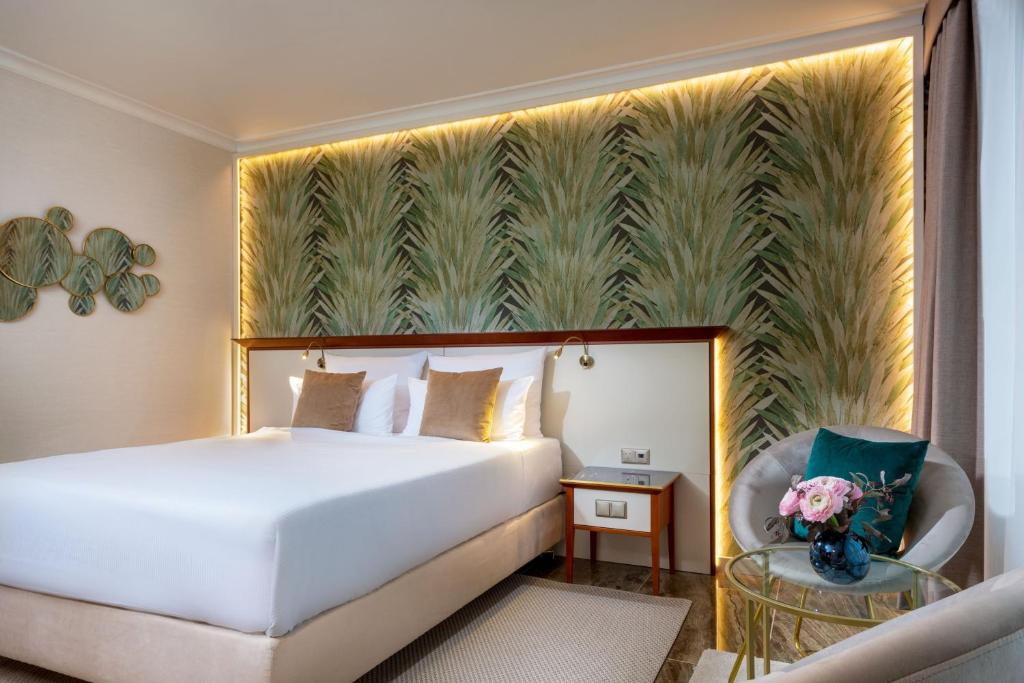 Ein Bett oder Betten in einem Zimmer der Unterkunft JW Marriott Hotel Berlin