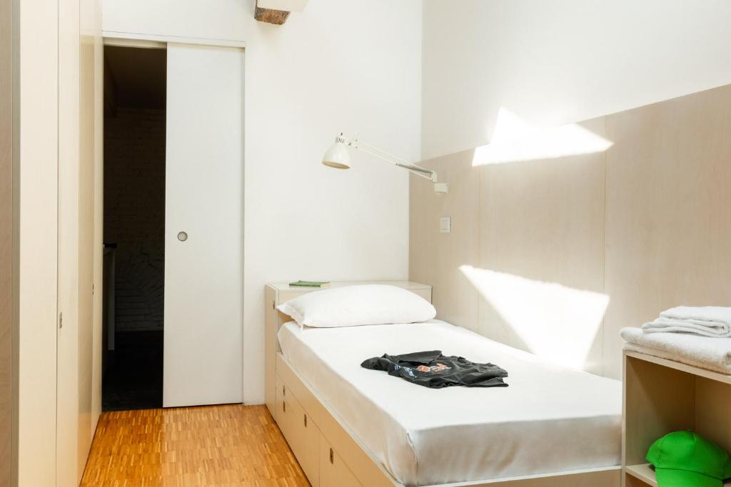 Postel nebo postele na pokoji v ubytování Combo Venezia
