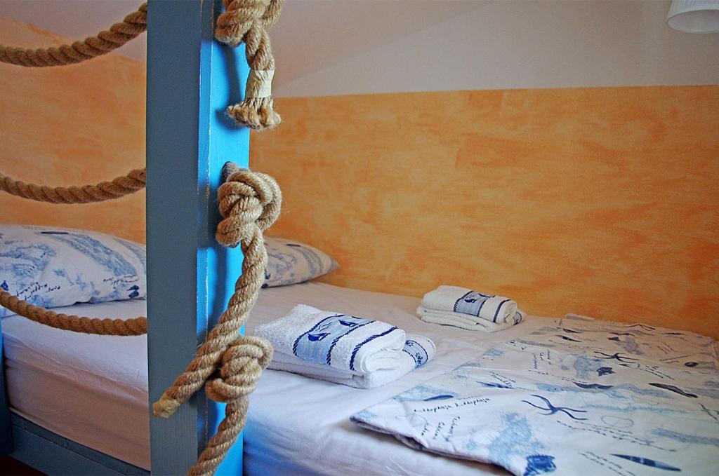 Postel nebo postele na pokoji v ubytování Beach house Adriana