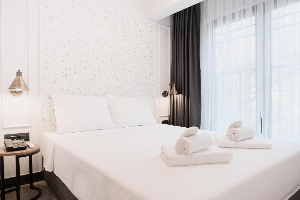 Llit o llits en una habitació de Persona Hotel Galata