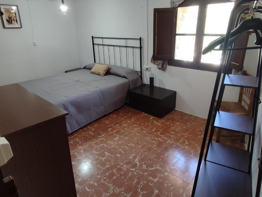 Postel nebo postele na pokoji v ubytování CASA DALMA