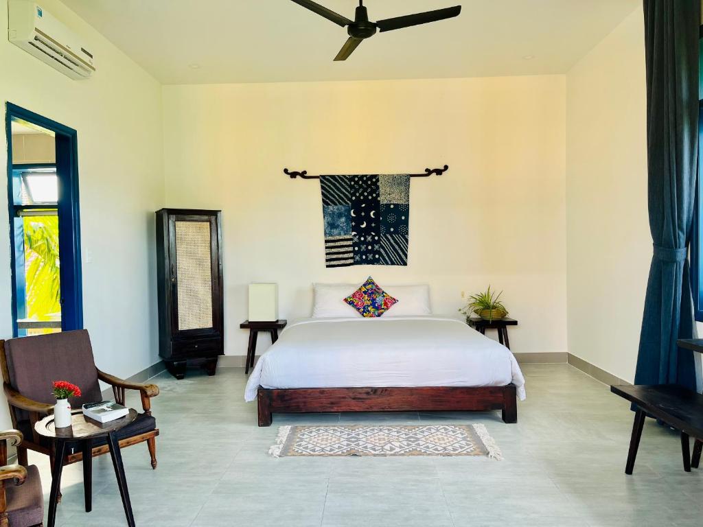 Postel nebo postele na pokoji v ubytování Chez Mimosa Hoi An - LUA Retreat