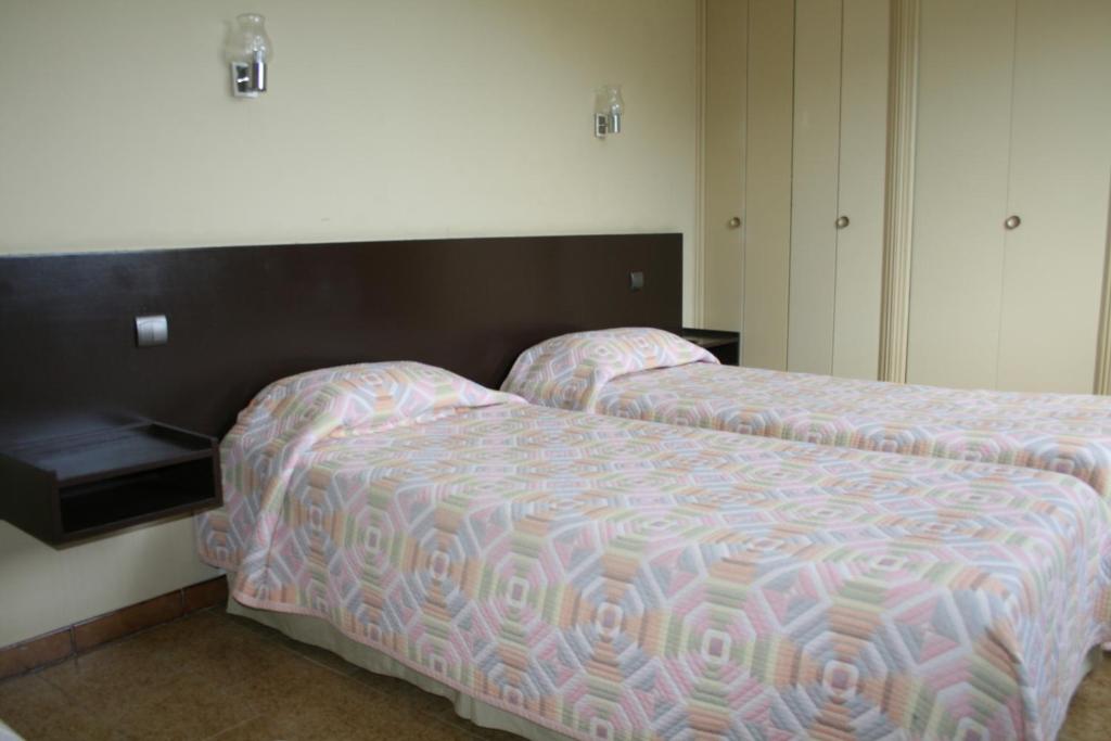 Postel nebo postele na pokoji v ubytování Le Refuge Orezza