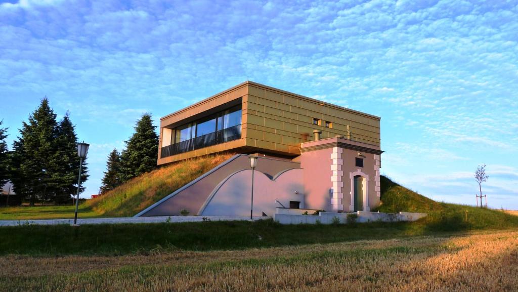 a house built on top of a hill at Hochbehälter Ockerwitz in Dresden