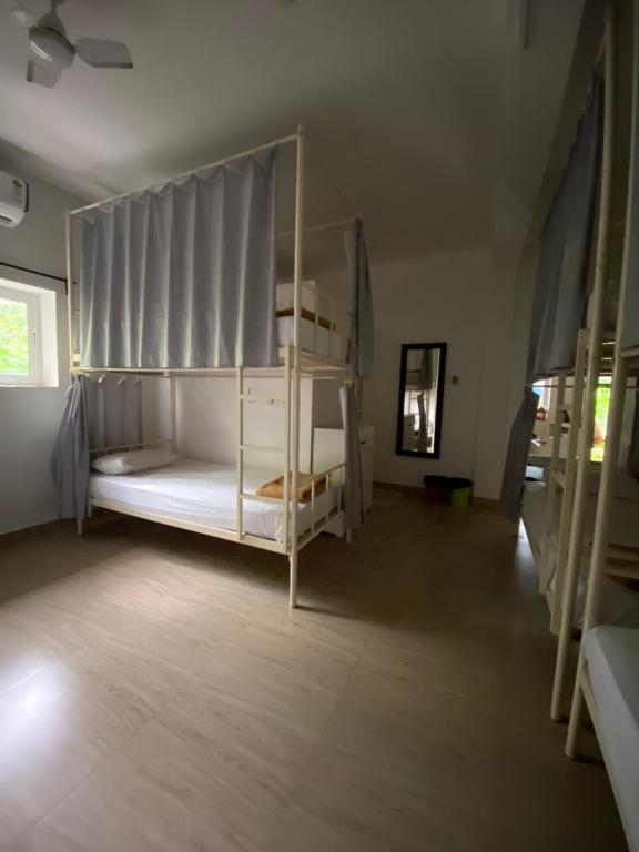 Postel nebo postele na pokoji v ubytování Hostel Mandala