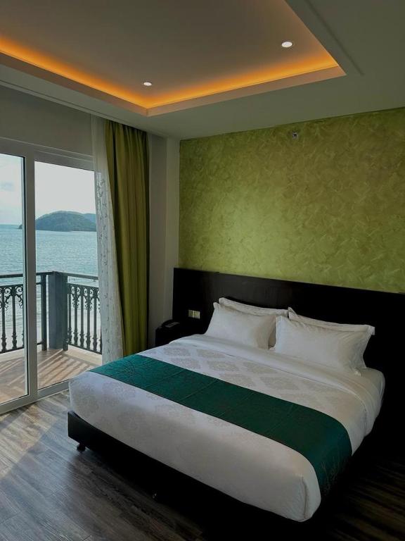 Postel nebo postele na pokoji v ubytování Malibest Resort