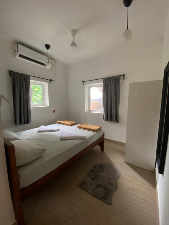Postel nebo postele na pokoji v ubytování Hostel Mandala