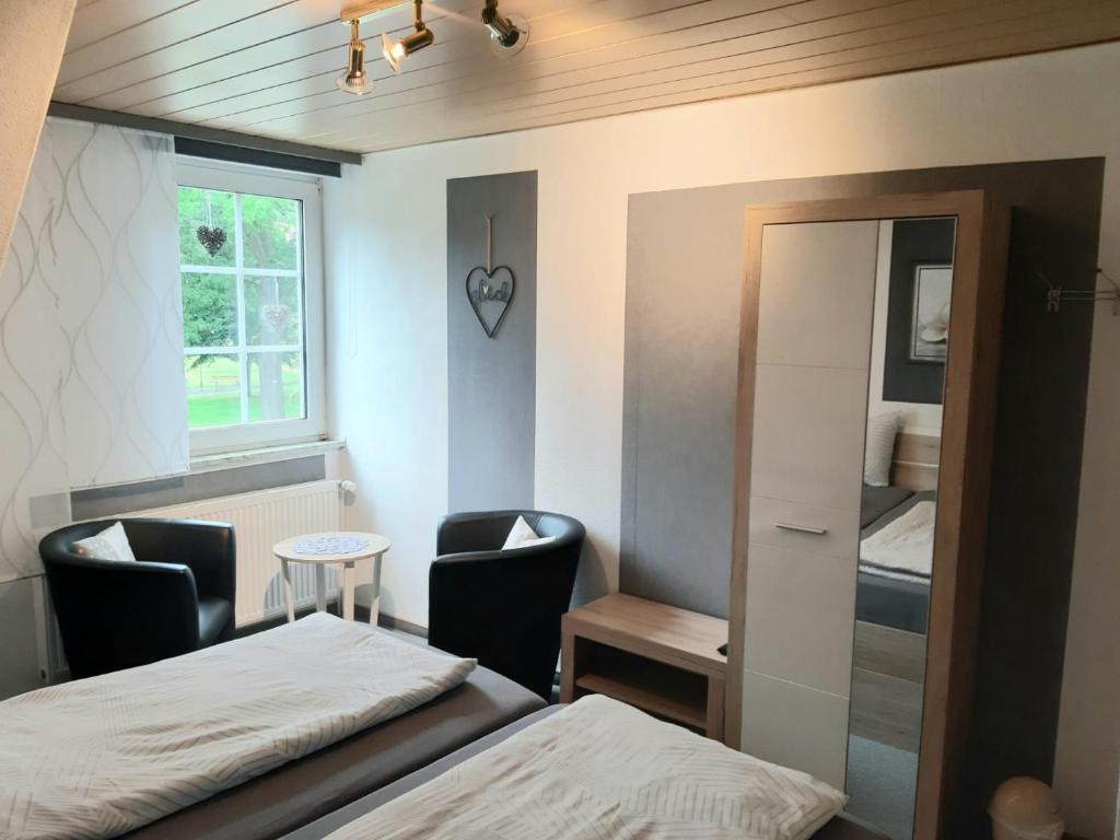 Postel nebo postele na pokoji v ubytování Gästehaus Dietrich