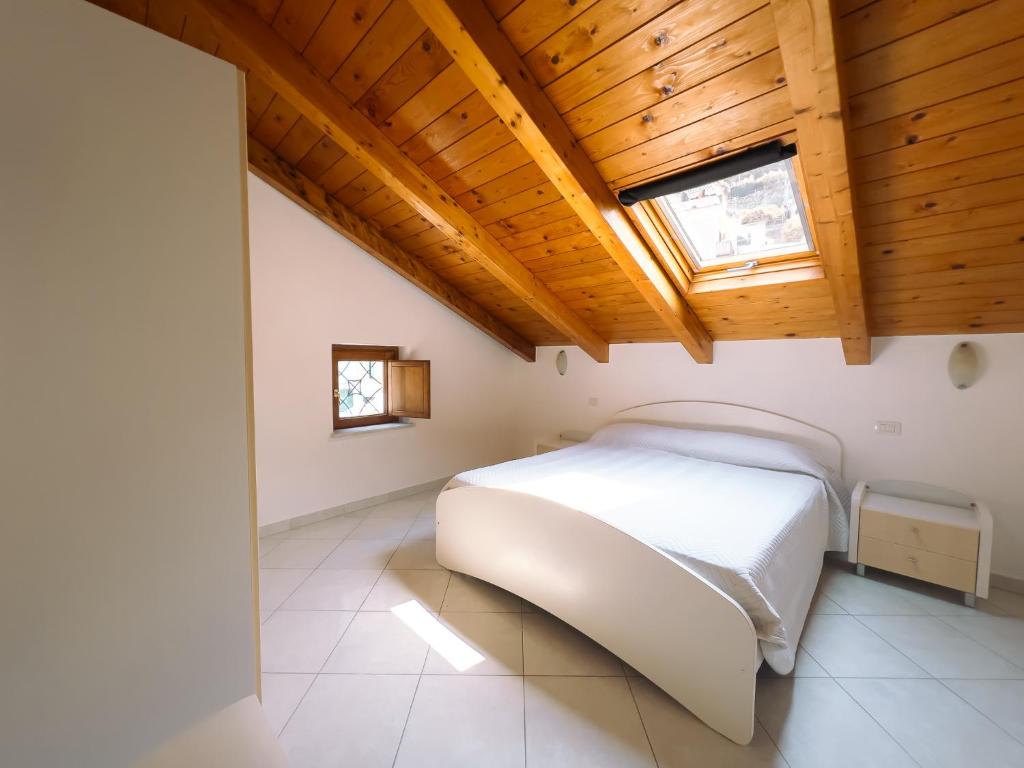 Postel nebo postele na pokoji v ubytování Residenza Ester