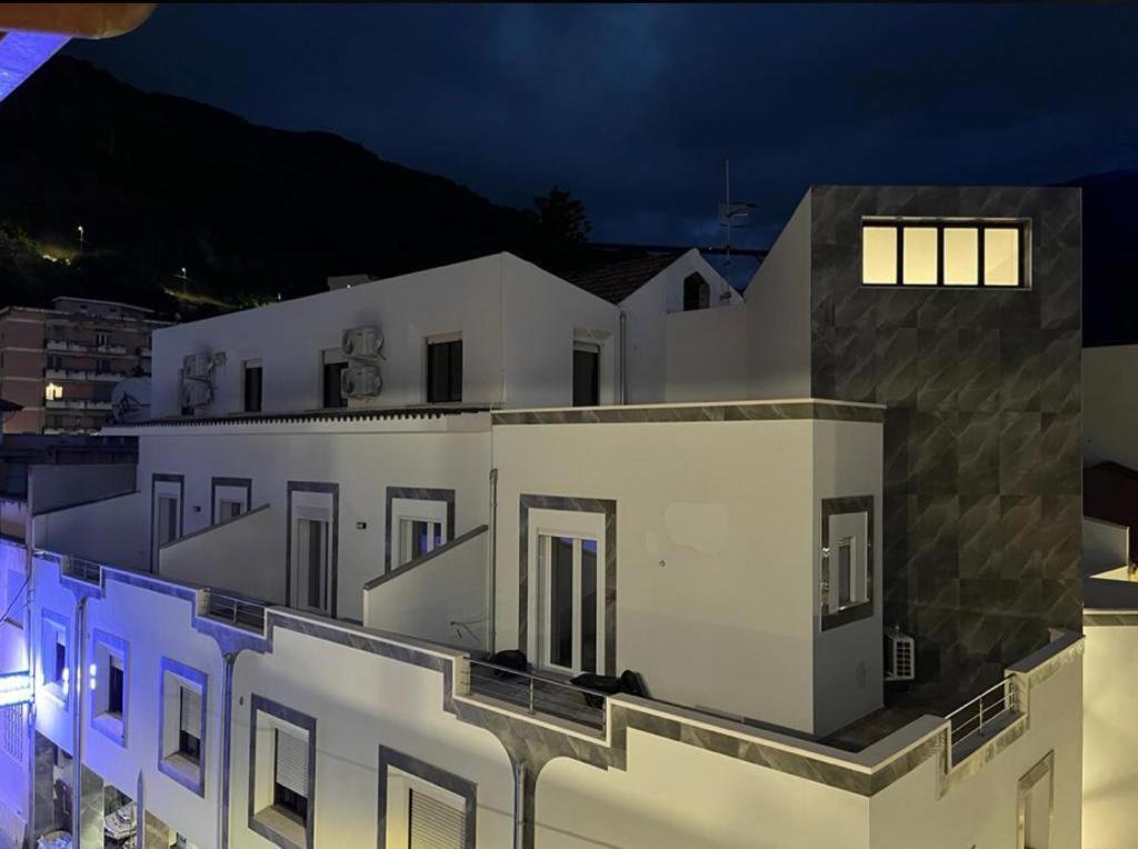 a view of a building at night at Maresol Residence in Bagnara Calabra