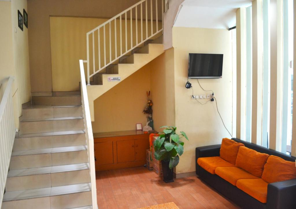 טלויזיה ו/או מרכז בידור ב-Semampir Residence By Occupied