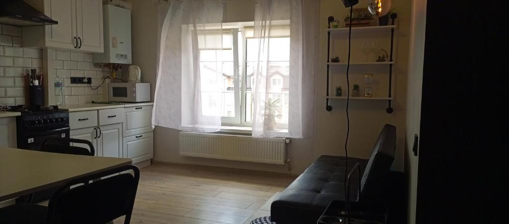 Kuchyň nebo kuchyňský kout v ubytování Apartment in Bozdosh estate
