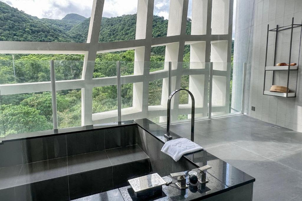 Kuchyň nebo kuchyňský kout v ubytování Orient Luxury Hotel-Jiaoxi