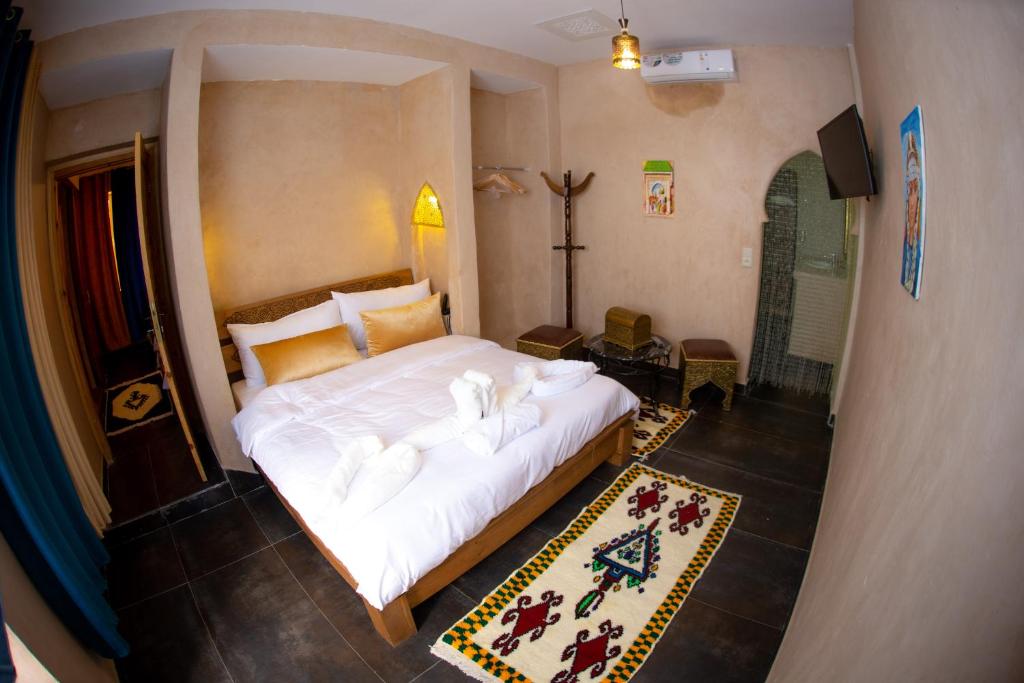 Postel nebo postele na pokoji v ubytování Maison D'hôtes IMINIGRAN & Spa