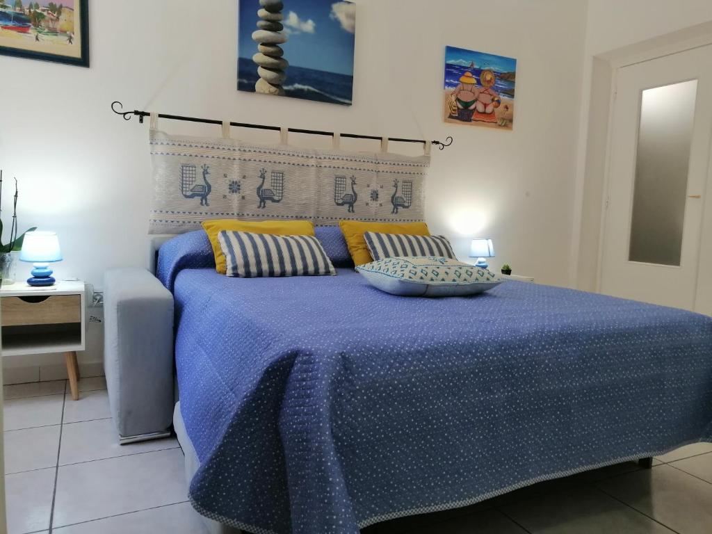 Postel nebo postele na pokoji v ubytování Le Peonie Guest House