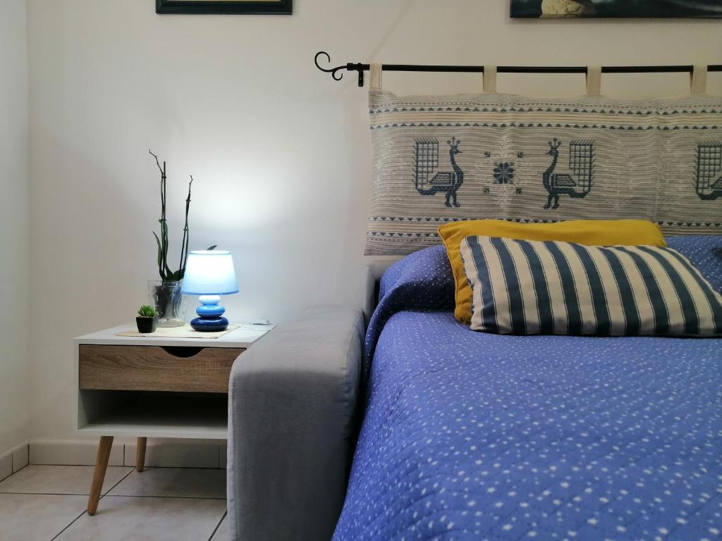 Postel nebo postele na pokoji v ubytování Le Peonie Guest House