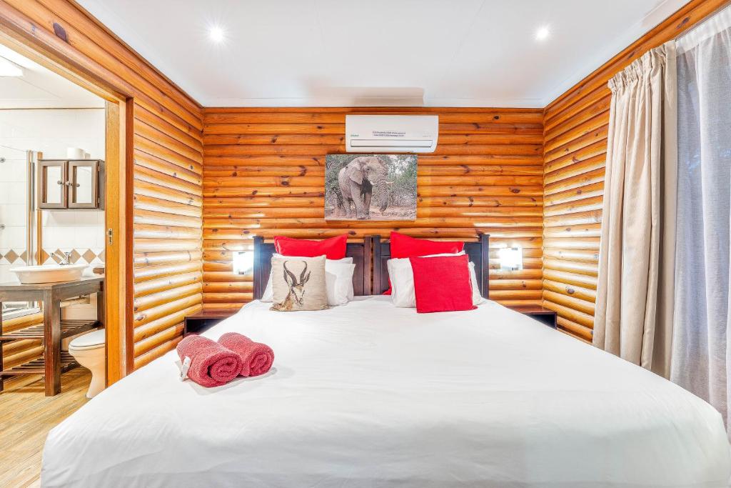 Postel nebo postele na pokoji v ubytování Sunset Lodge