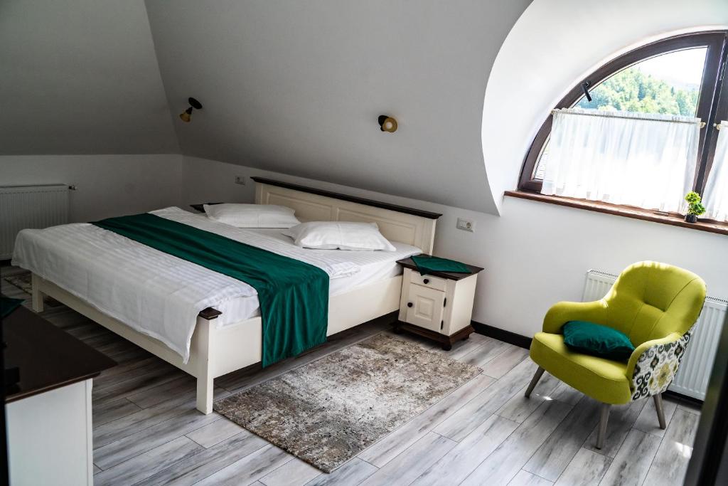 Postel nebo postele na pokoji v ubytování Casa Românească