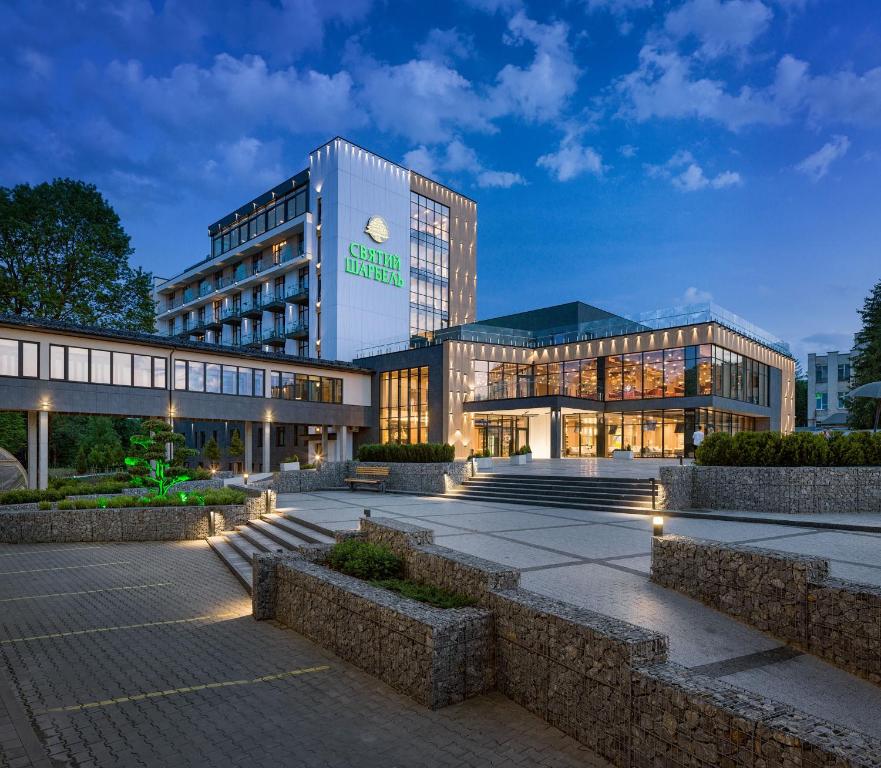 a large building with lights in front of it at Святий Шарбель in Morshin