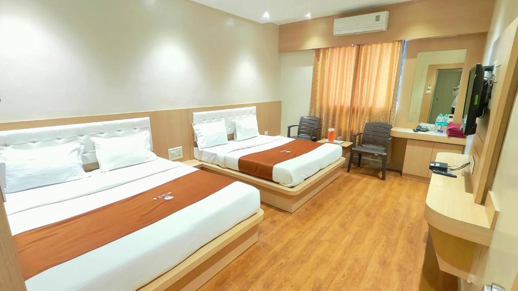 Postel nebo postele na pokoji v ubytování Hotel Yog Palace Newly Renovated