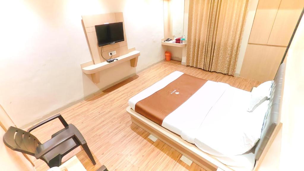 TV a/nebo společenská místnost v ubytování Hotel Yog Palace Newly Renovated