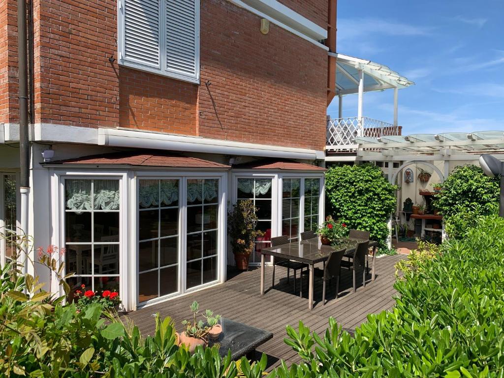 Vonkajšia záhrada v ubytovaní Maison Renée Viareggio
