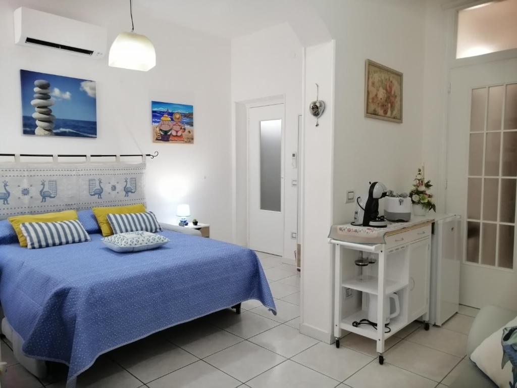 Postel nebo postele na pokoji v ubytování Le Peonie Guest House