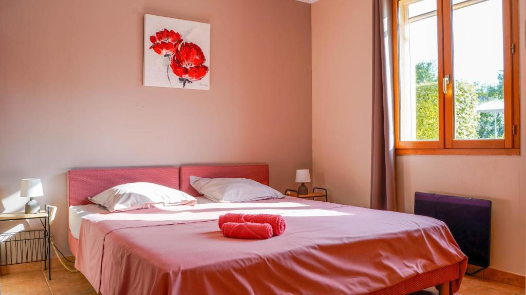 Postel nebo postele na pokoji v ubytování Mon Ginesté