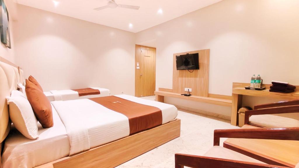 TV a/nebo společenská místnost v ubytování Hotel 9 Coin