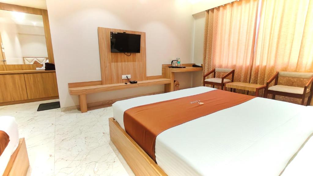 TV a/nebo společenská místnost v ubytování Hotel 9 Coin