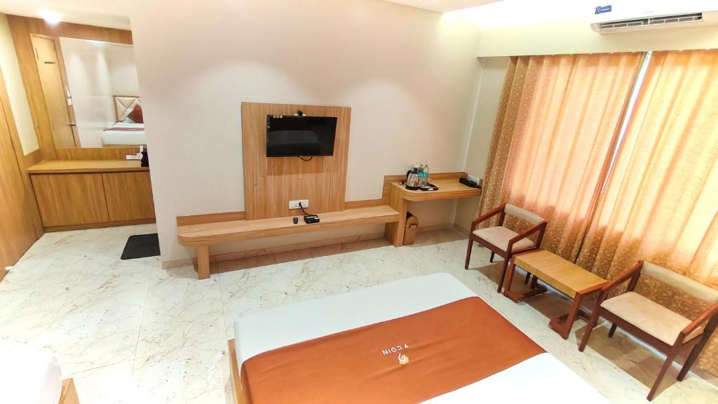 TV a/nebo společenská místnost v ubytování Hotel 9 Coin