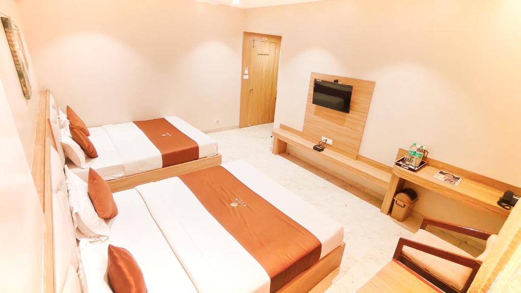 TV a/nebo společenská místnost v ubytování Hotel 9 Coin