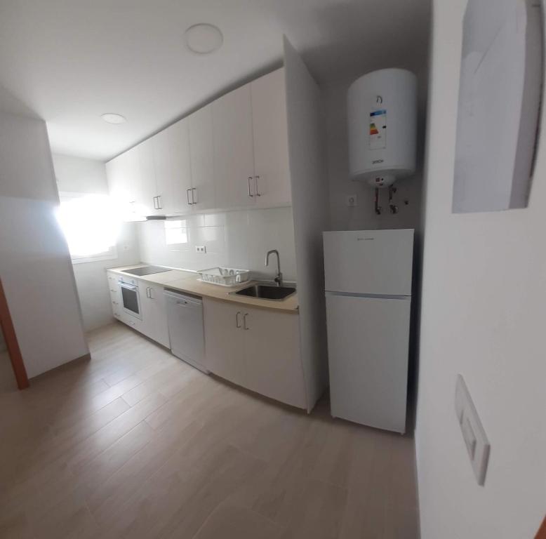 Η κουζίνα ή μικρή κουζίνα στο APARTAMENTOS sol y playa
