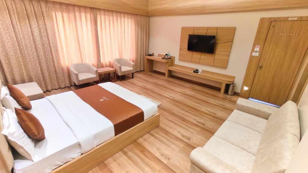 TV a/nebo společenská místnost v ubytování Hotel 9 Coin