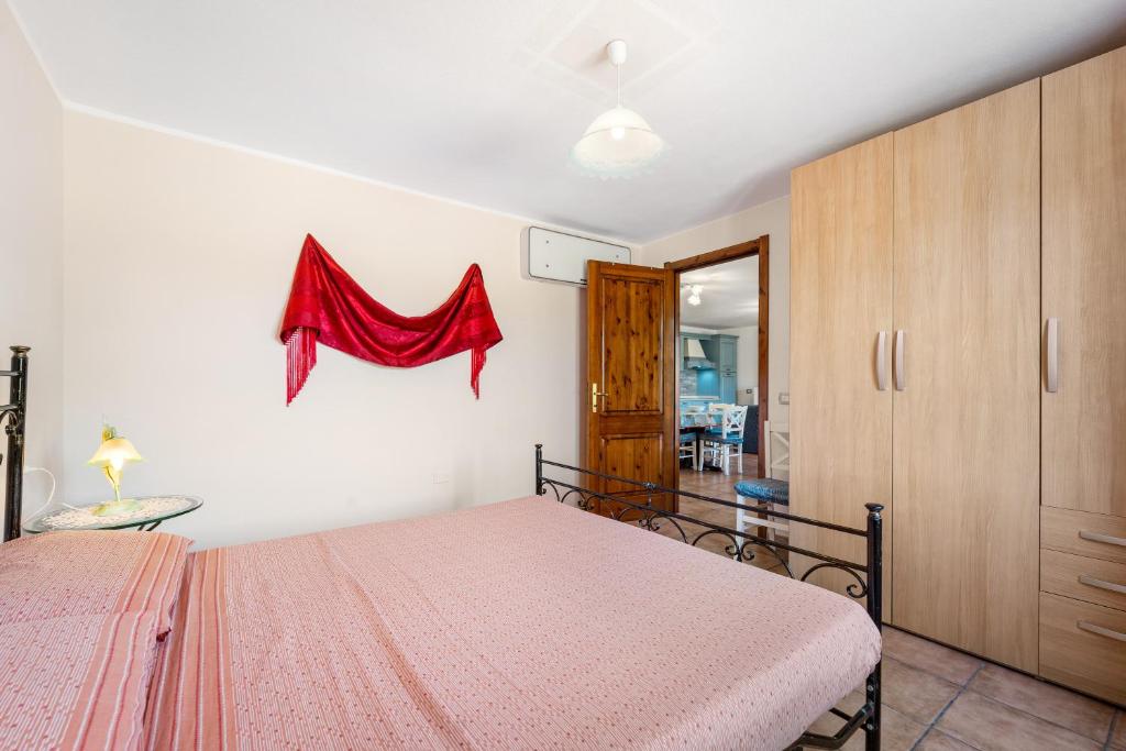 Postel nebo postele na pokoji v ubytování Casa Oleandro