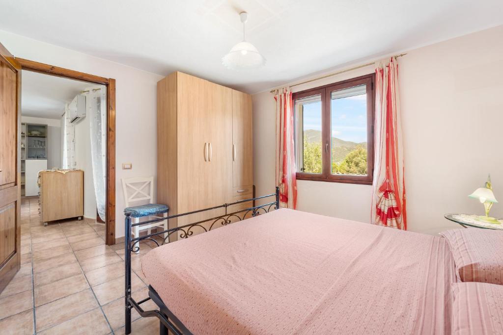 Postel nebo postele na pokoji v ubytování Casa Oleandro