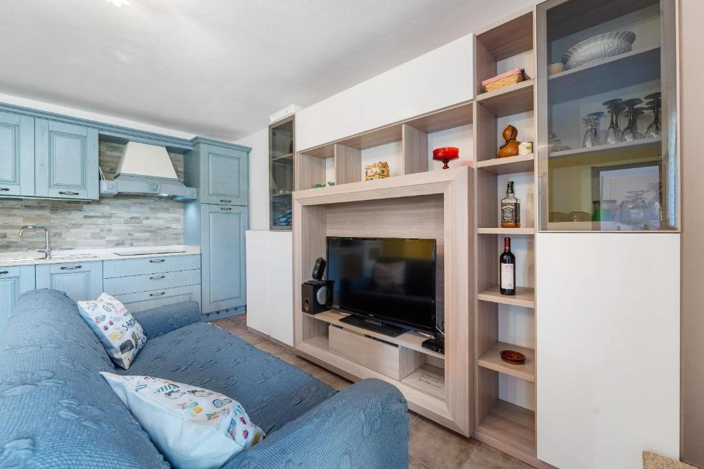 TV a/nebo společenská místnost v ubytování Casa Oleandro