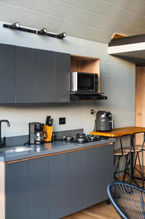 Kuchyň nebo kuchyňský kout v ubytování 5CHALETS