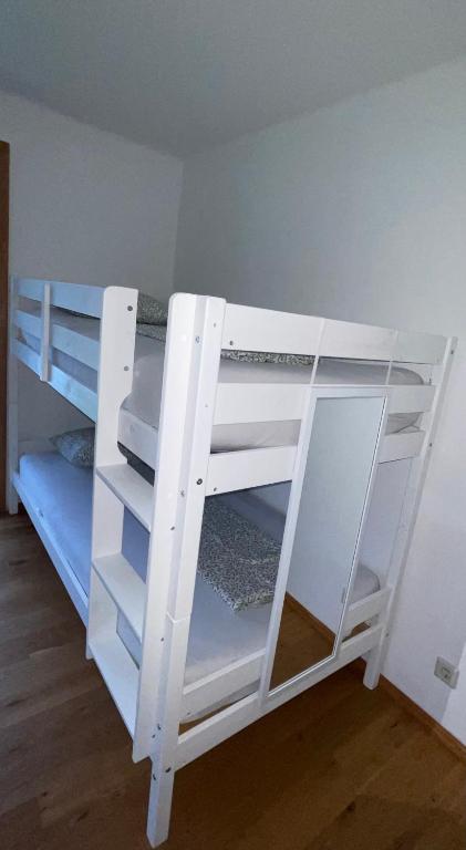 Postel nebo postele na pokoji v ubytování Almsternderl 2.0 - gemütliches Appartment in Gosau