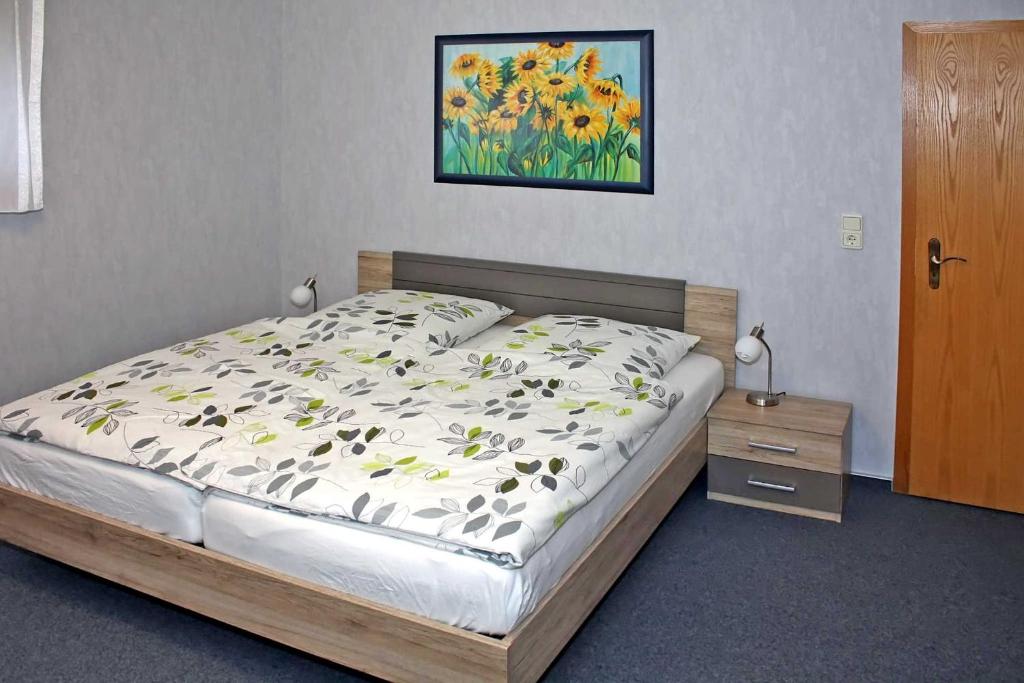 Giường trong phòng chung tại Ferienwohnung Brandshagen